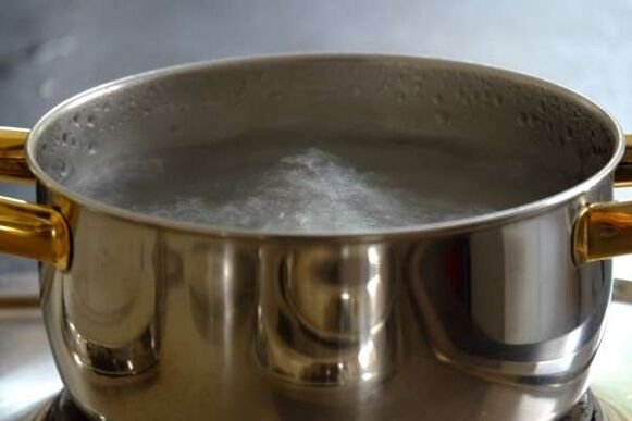 Frying pan with heated water to warm the penis
